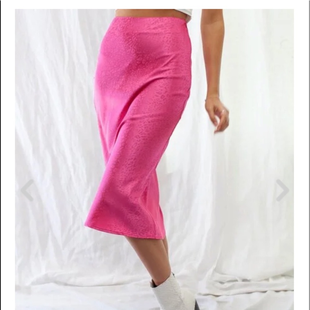 Long pink cheetah skirt.